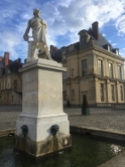 a statue that I am sure has some significance, standing outside the chateau
